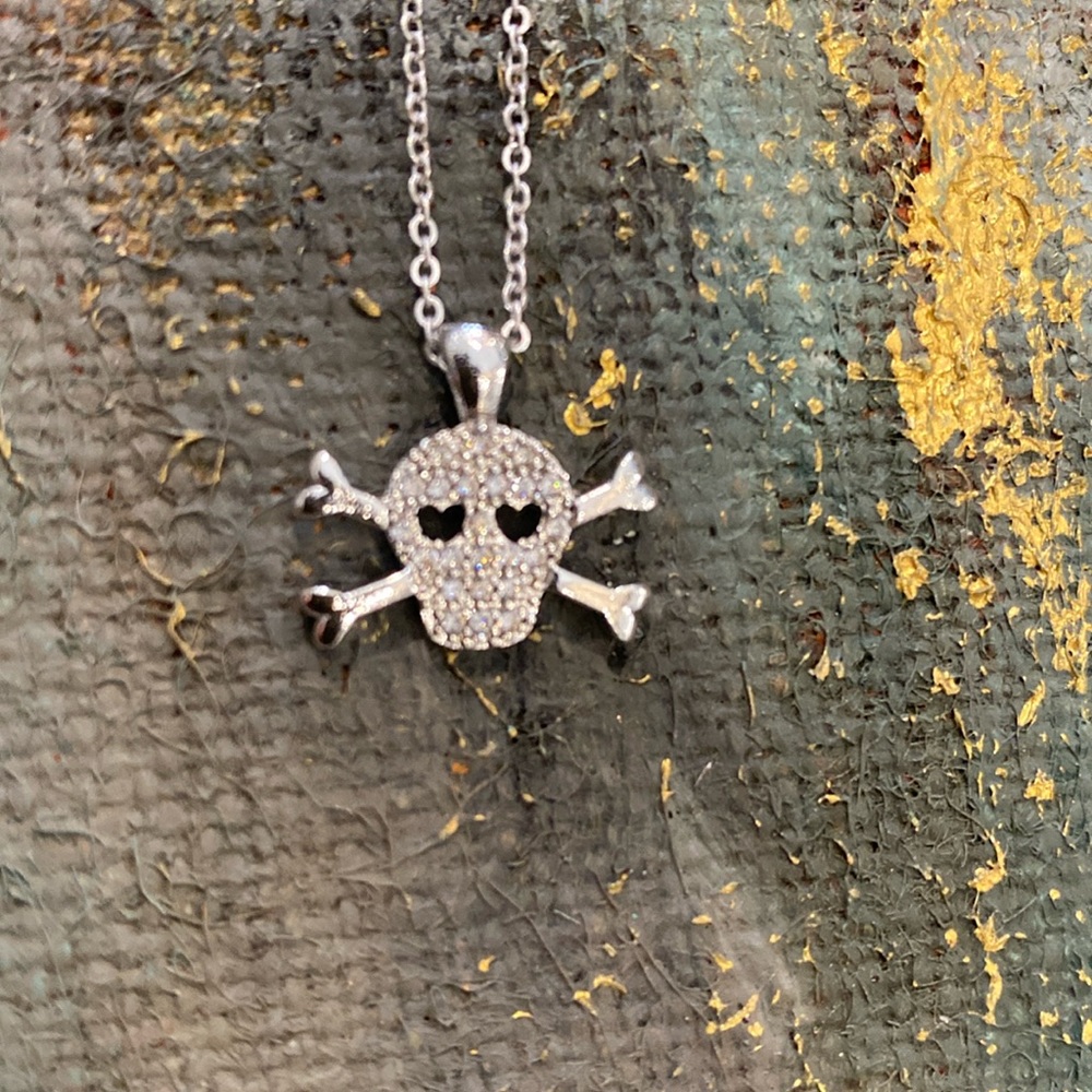 Scull and bones necklace with rhinestones